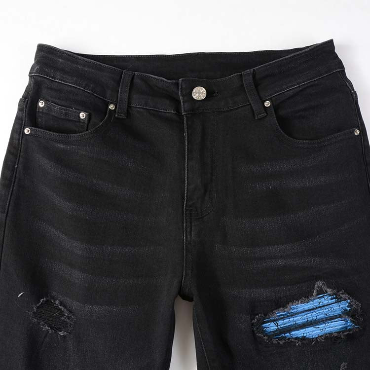 Jeans noir déchire avec patch bleu surpiqûre