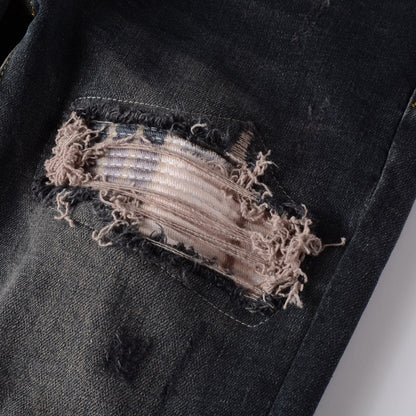 Jeans délavé déchire à patch clair