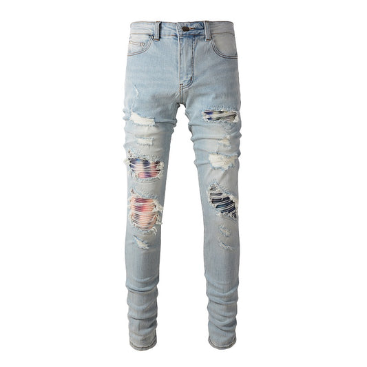 Jeans bleu clair déchire avec patch motif colore en surpiqure