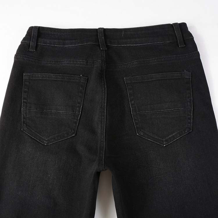 Jeans noir déchire avec patch bleu surpiqûre