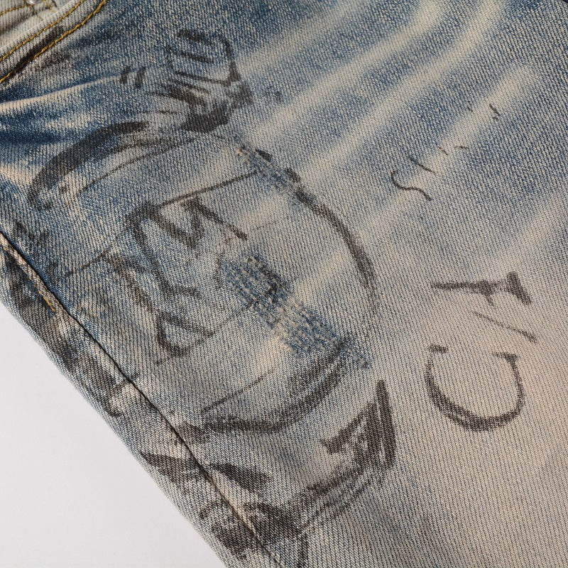 Jeans délavé à motif discret