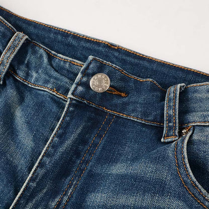 Jeans bleu délavé déchire avec patch en surpiqûre noir