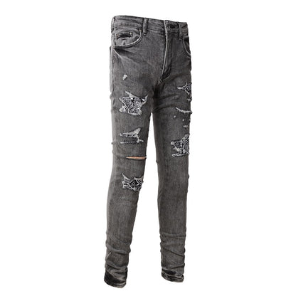 Jeans gris déchire à patch avec dessin