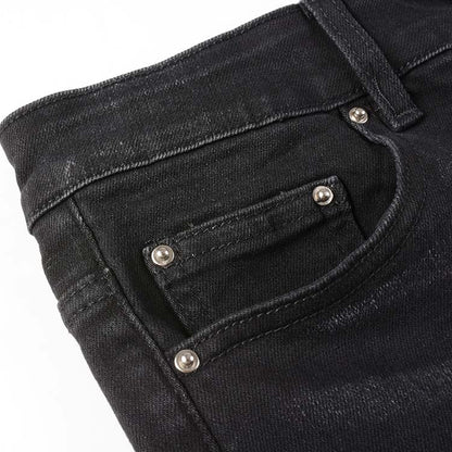 Jeans noir déchire avec patch bleu surpiqûre