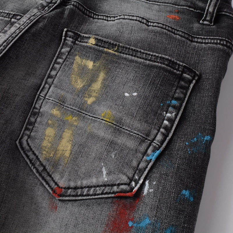 Jeans gris délavé éclat de peinture