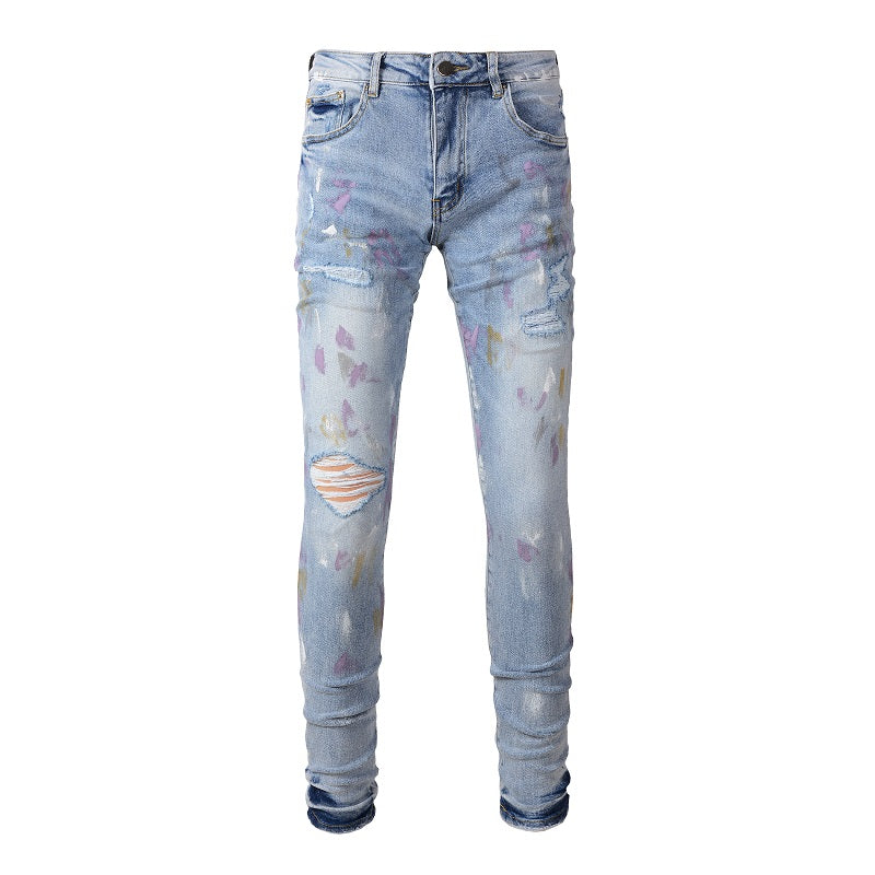 Jeans bleu avec trace de peinture