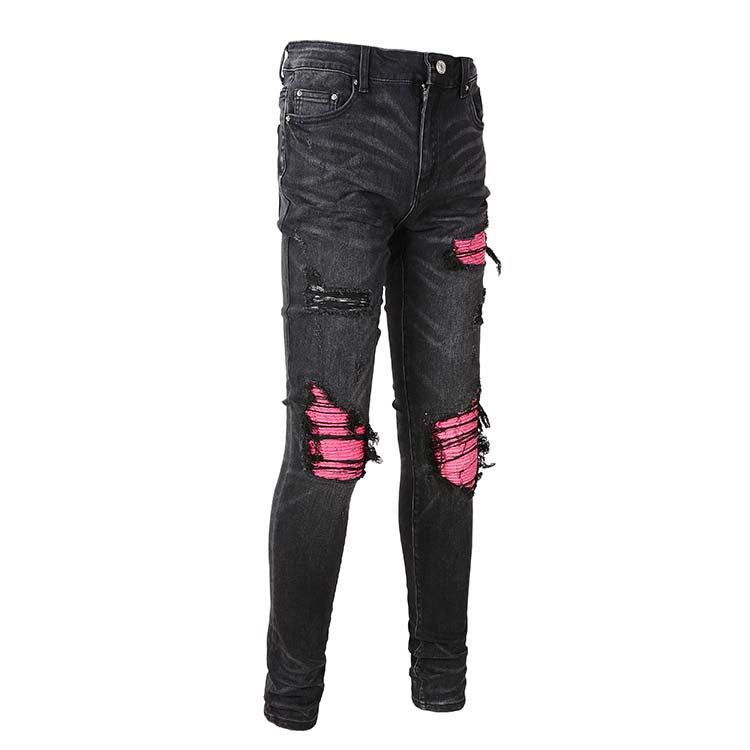 Jeans noir déchire avec patch rose surpiqûre