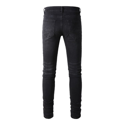 Denim noir déchirure patch intrigue en surpiqûre