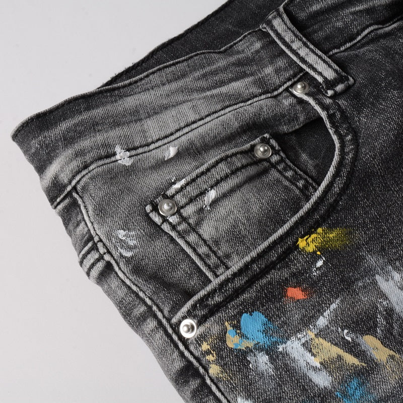 Jeans gris délavé éclat de peinture