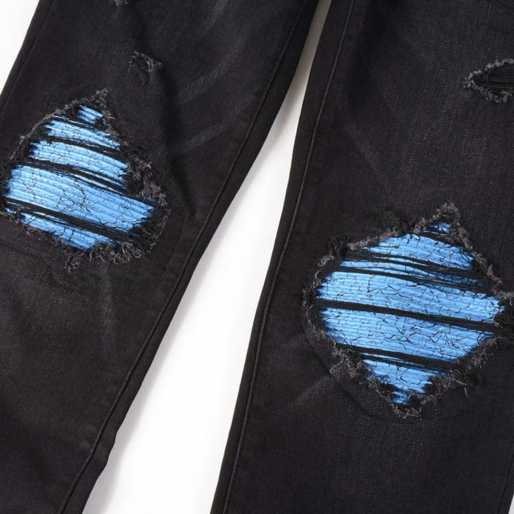 Jeans noir déchire avec patch bleu surpiqûre