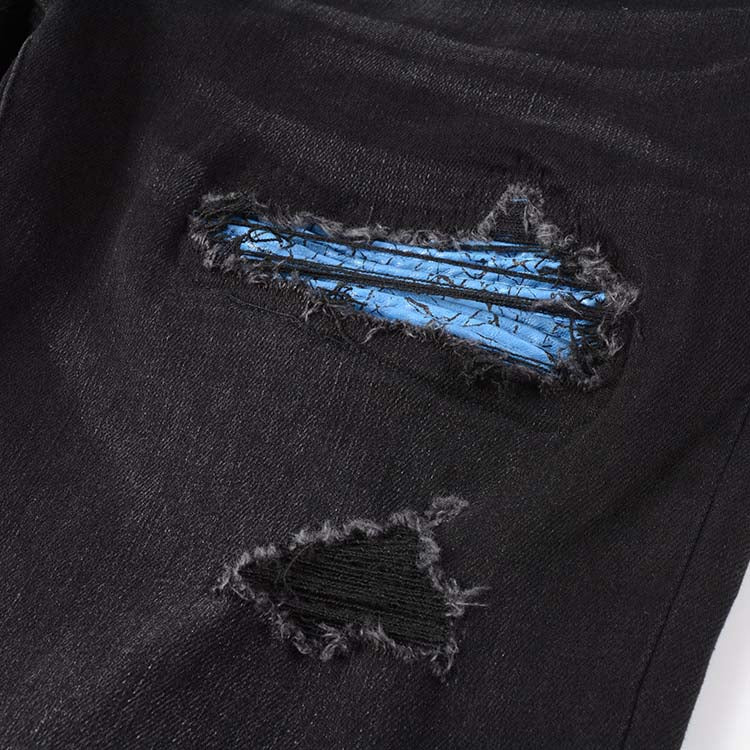 Jeans noir déchire avec patch bleu surpiqûre