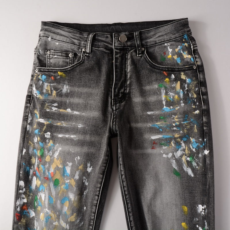 Jeans gris délavé éclat de peinture