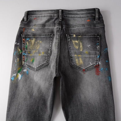 Jeans gris délavé éclat de peinture