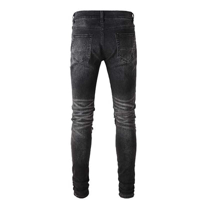 Jeans noir déchire avec patch dessiner