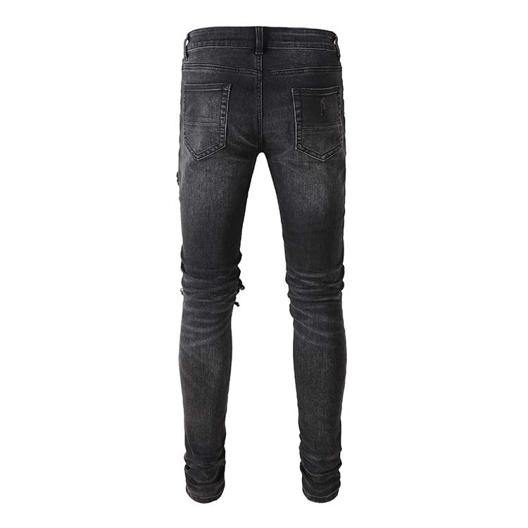 Jeans noir déchire avec patch rose surpiqûre