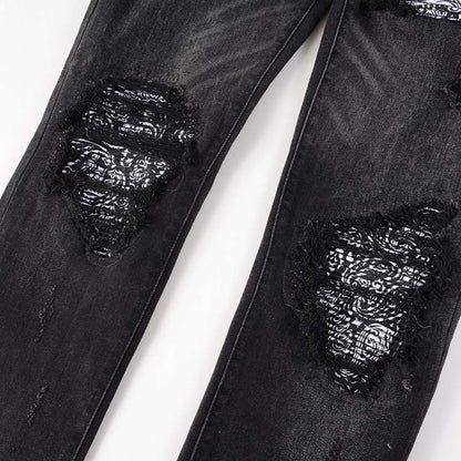 Jeans noir déchire avec patch dessiner