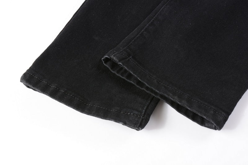 Jeans biker noir poche discrète