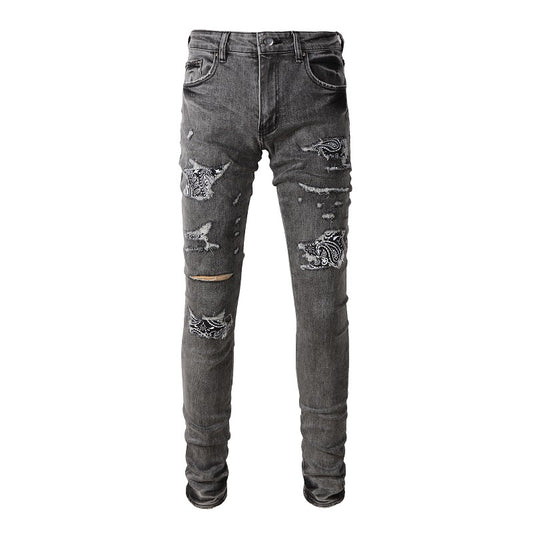 Jeans gris déchire à patch avec dessin