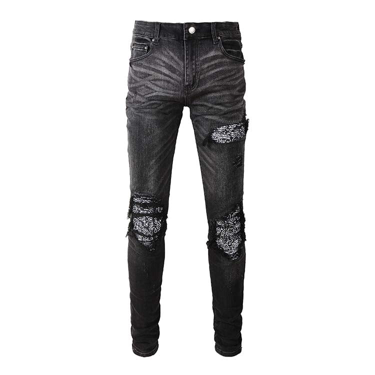 Jeans noir déchire avec patch dessiner