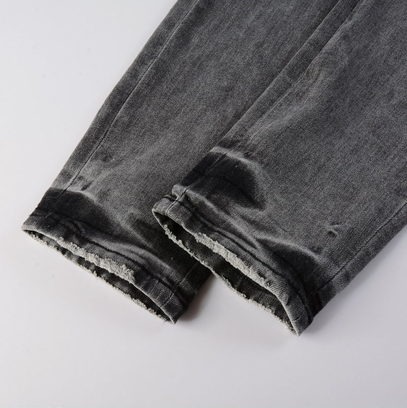 Jeans gris déchire à patch avec dessin