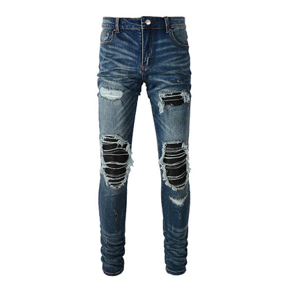 Jeans bleu délavé déchire avec patch en surpiqûre noir