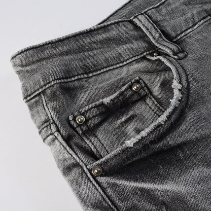 Jeans gris déchire à patch avec dessin