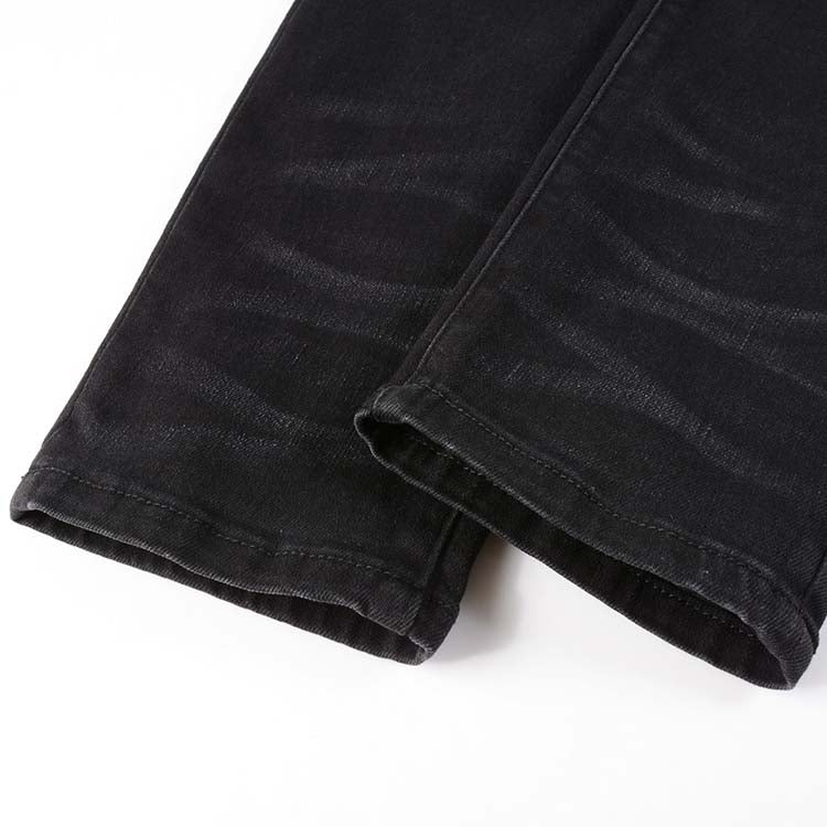 Jeans noir déchire avec patch bleu surpiqûre