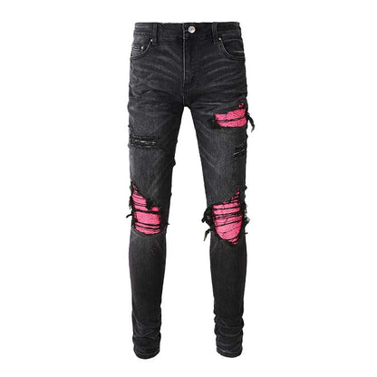 Jeans noir déchire avec patch rose surpiqûre