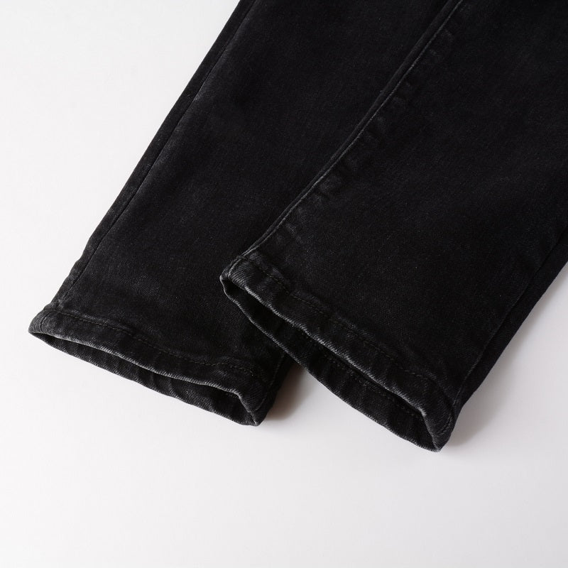 Denim noir déchirure patch intrigue en surpiqûre