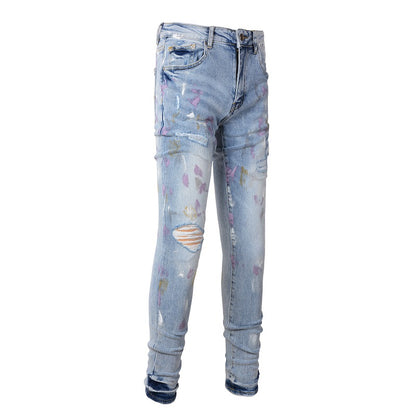 Jeans bleu avec trace de peinture