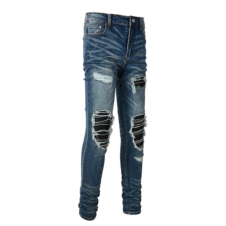 Jeans bleu délavé déchire avec patch en surpiqûre noir