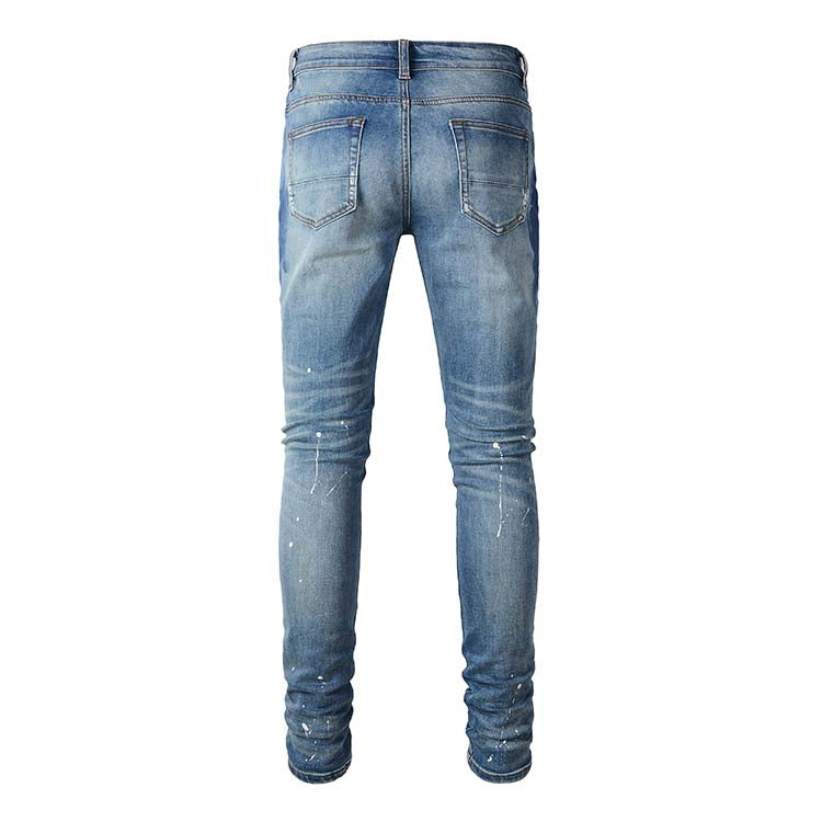 Jeans bleu délavé déchire avec surpiqûre bleu strass