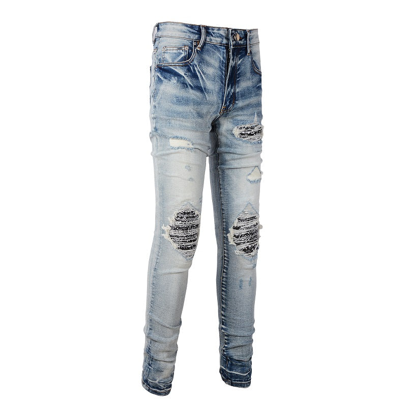 Jeans bleu déchirure avec patch en tissus