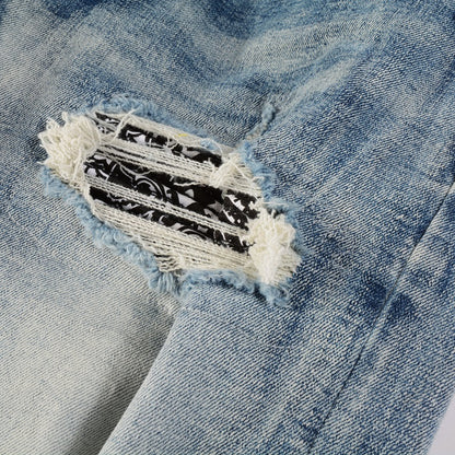 Jeans bleu déchirure avec patch en tissus