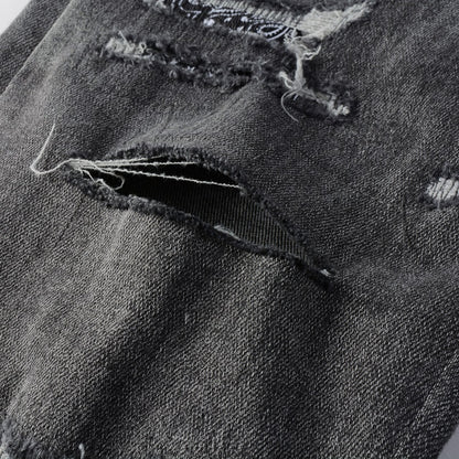 Jeans gris déchire à patch avec dessin