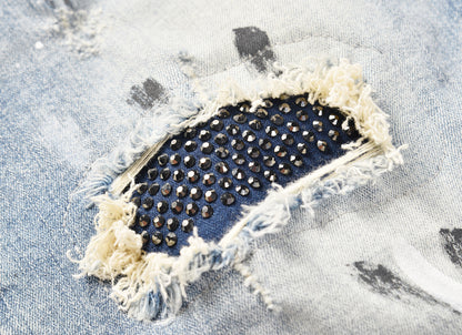 Denim à patchs cloutés